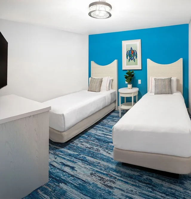 جناح عائلي بسرير كينج وسرير كينج وسريرين منفصلين، Compass by Margaritaville Hotel Pigeon Forge 1/3