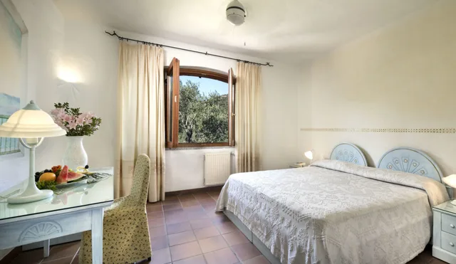 غرفة كلاسيكية بإطلالة على الحديقة مفردة بسرير مزدوج، Myo Hotel Rocce Sarde 1/1