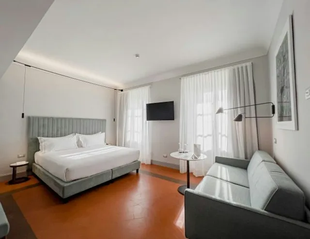 غرفة ديلوكس بسرير مزدوج، Albergo Duomo 3/8