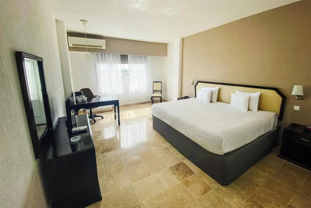 جناح جونيور بسرير كينج مع أريكة، Days Inn by Wyndham Tuxtepec 5/10
