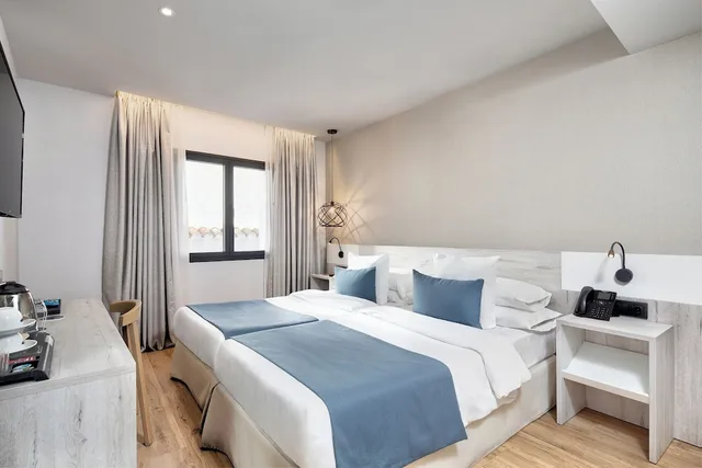 غرفة كلاسيكية بسريرين منفصلين، Obal Urban Hotel 1/3