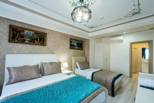 غرفة عائلية ثلاثية بسرير كوين وسرير فردي، Atam Suites Apart 5/10