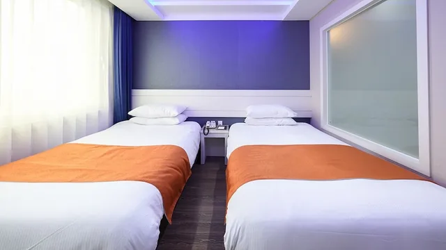 غرفة قياسية بسريرين منفصلين، Jeju Galaxy Hotel 3/5