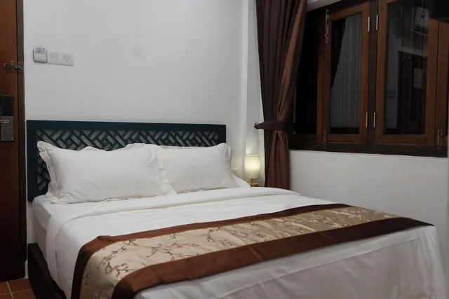 غرفة قياسية بسرير كوين، Mclane Boutique Hotel 1/7