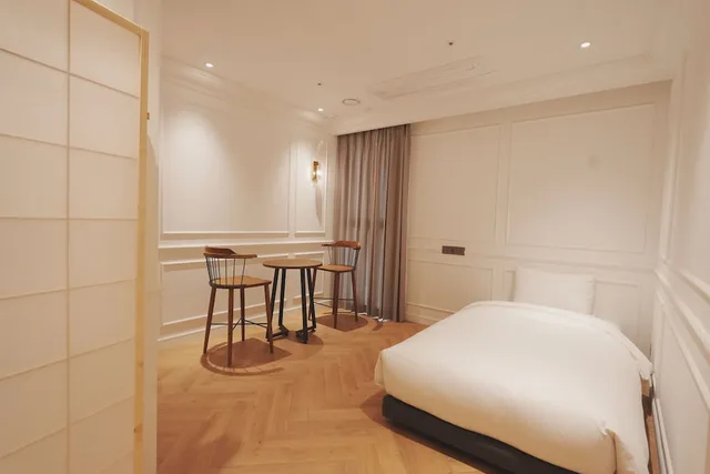 جناح ملكي بسريرين كينج وثلاثة أسرّة، Busan City Hotel 3/10