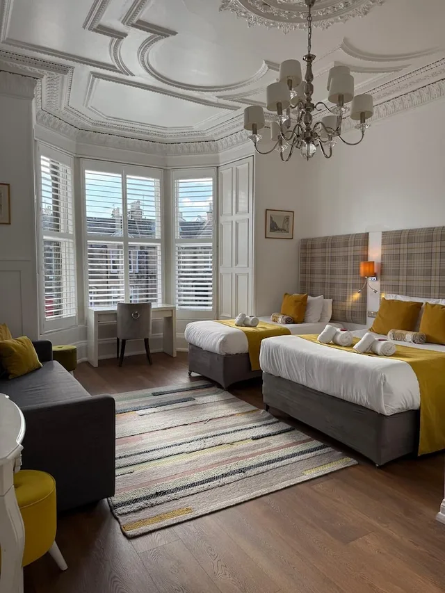 غرفة عائلية بسرير مزدوج وسرير فردي، The International Guest House 3/10