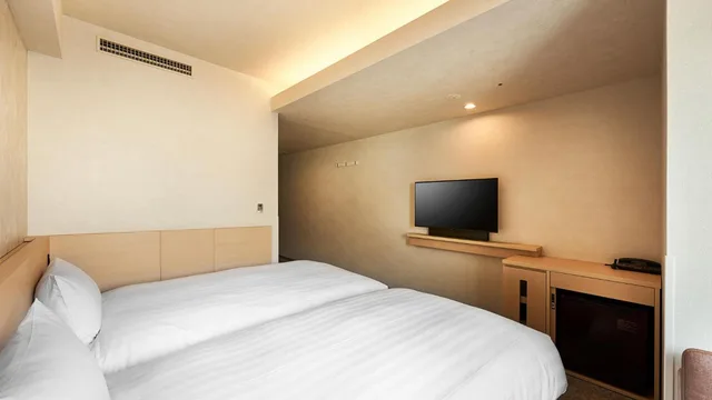 غرفة اقتصادية بسريرين منفصلين للمدخنين، Daiwa Roynet Hotel Kawasaki 1/2