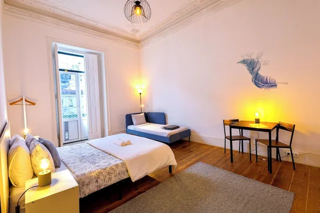 غرفة ديلوكس ثلاثية بسرير مزدوج وسرير فردي بإطلالة على المدينة بحمام مشترك، Ambiente Hostel 5/8