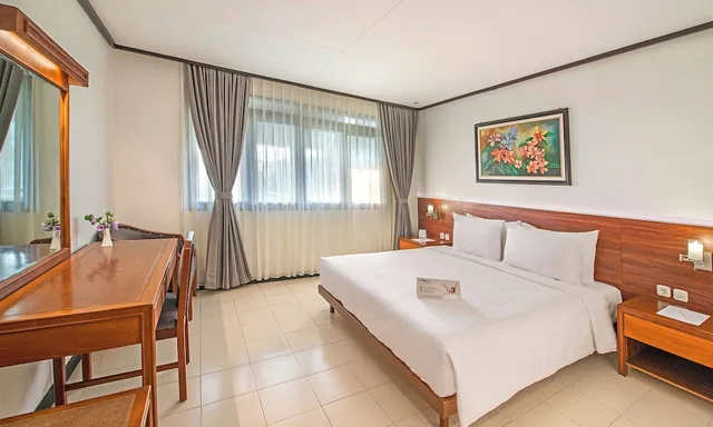 غرفة عائلية بسرير كوين وسريرين منفصلين، Grand Whiz Hotel Bromo 1/2