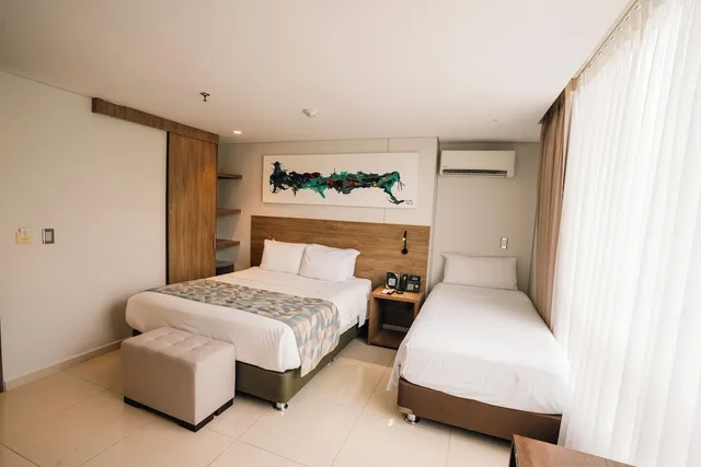 غرفة قياسية بسرير مزدوج وسرير فردي، Hotel Ambar Boutique 1/10