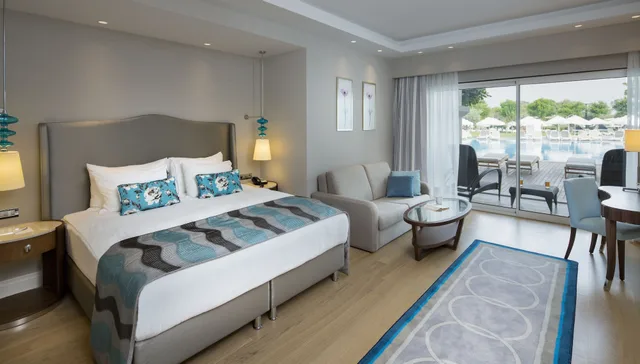 Swim Up, Pool, Family, Suite, Queen and Twin Beds, 2 Sofa، Titanic Deluxe Golf Belek 4/10