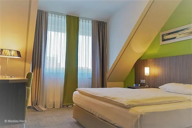 غرفة بسرير كينج، Hotel Ambiente Walldorf 1/6