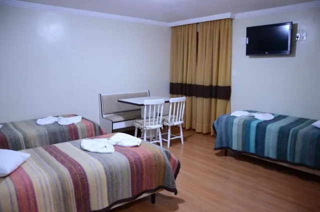 غرفة ديلوكس ثلاثية بسرير مزدوج وسرير فردي، Zermatt Hotel 5/8