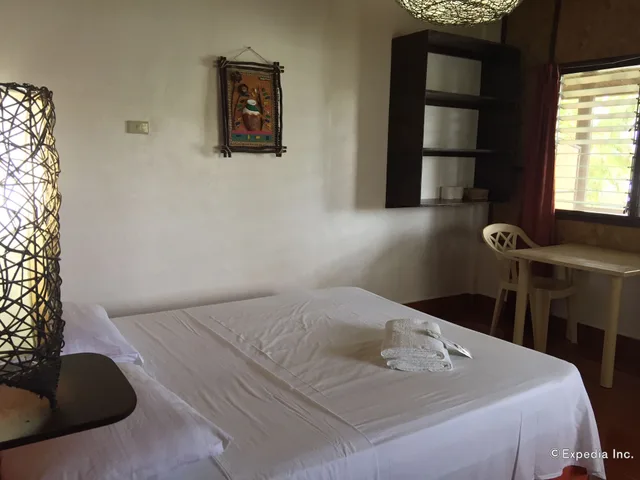 كوخ بإطلالة على البحر، Discovery Island Resort and Dive Center 1/4