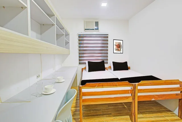 Deluxe, Twin Beds, Collection O Metro Manila near University Belt formerly 1318 Residences 1/3