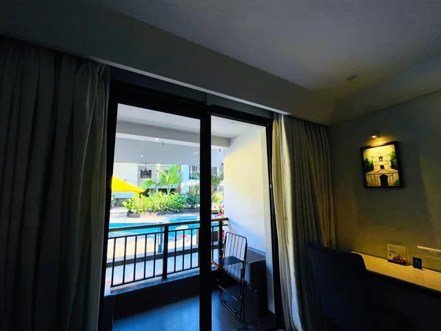 Room, Double Bed, Pool View, Balcony, Sobit Sarovar Portico Goa 4/10