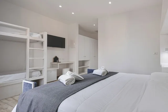غرفة بريميوم رباعية بسرير مزدوج وسرير بطابقين، Evo Boutique Hotel 2/3