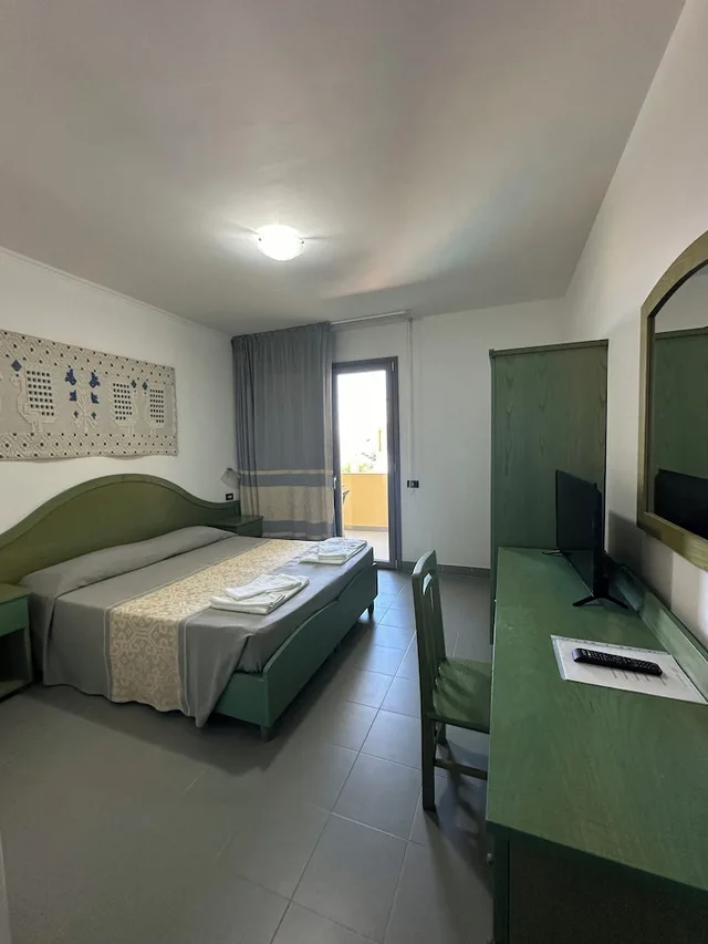 غرفة قياسية بسرير مزدوج أو سريرين منفصلين، Corte Cala Dei Pini 1/7