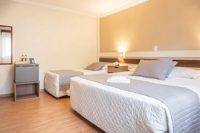 غرفة قياسية بسرير مزدوج وسرير فردي، Hotel Bertoluci 1/10