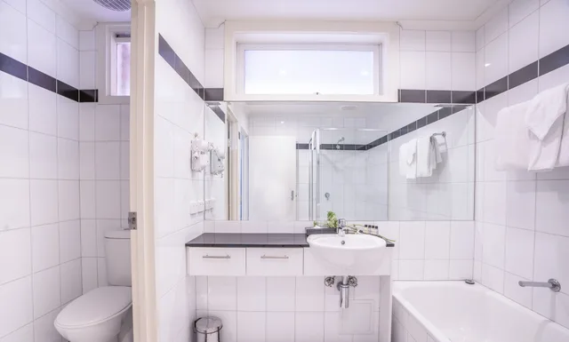 غرفة تنفيذية بسرير كينج وسرير كوين بغرفتي نوم، Carlton Clocktower Apartments 4/5
