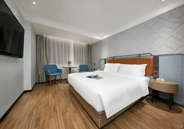 غرفة كومفورت بسرير كينج، Kaiserdom Hotel Huayue 1/1