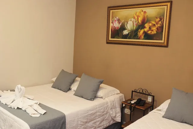 غرفة اقتصادية ثلاثية بسرير مزدوج وسرير فردي، VOA Hotel Rezende 4/7