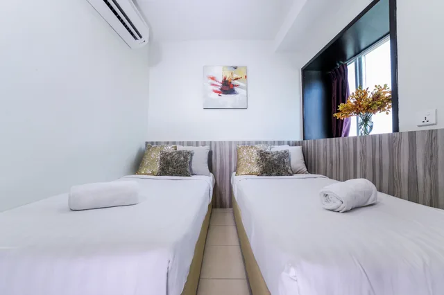 غرفة قياسية مزدوجة، Capital O 90545 Ho Hotel 1/3