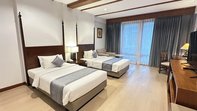 غرفة ديلوكس بسرير كينج بإطلالة على المسبح، Belle Villa Resort Chiangmai 1/5