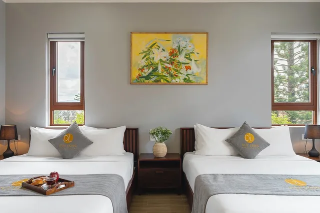 غرفة ديلوكس رباعية بسريرين كوين بشرفة، Duy Long Hotel 1/6