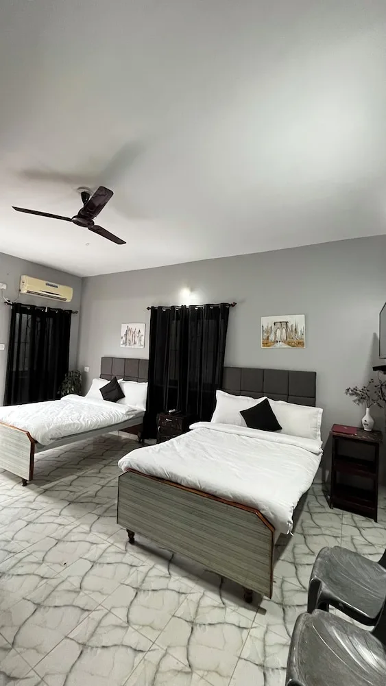 غرفة ديلوكس رباعية بسريرين منفصلين، Casa Almeida Guest House 2/4