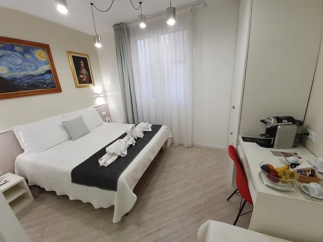 غرفة ديلوكس بسرير كوين وسرير فردي بحوض استحمام، Residence Eleonora 1/7