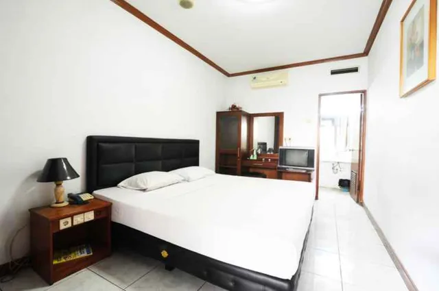 غرفة ديلوكس بسرير مزدوج، DeQur Hotel Bandung 1/3