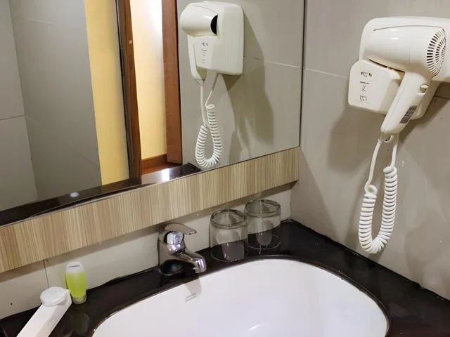 غرفة بزنس بسرير كوين، Top Malioboro Hotel 4/7