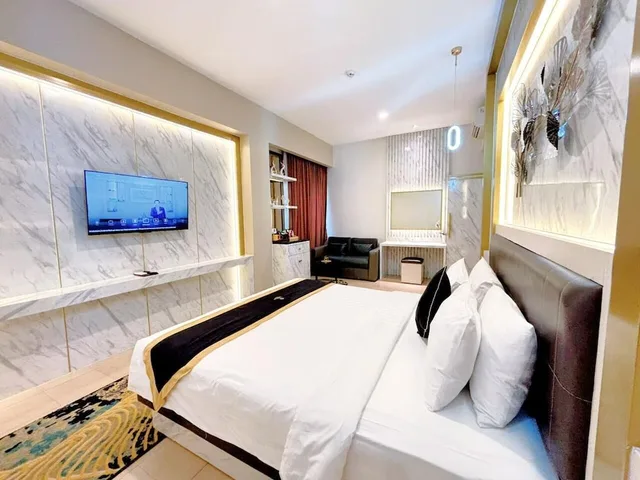 غرفة تنفيذية بسرير كينج، Grand Malioboro Yogyakarta Hotel 1/5