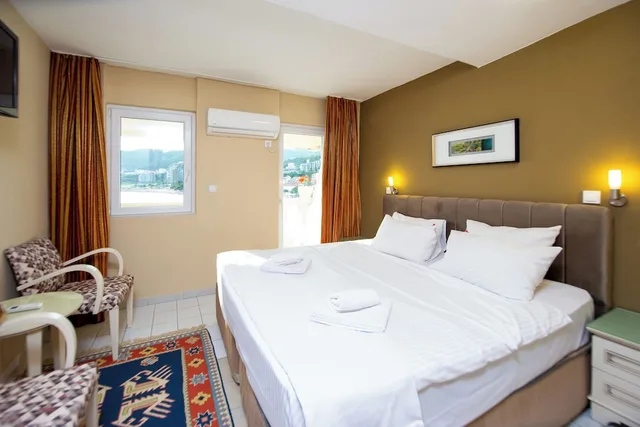 جناح عائلي بسرير مزدوج وسريرين منفصلين بإطلالة على البحر، Hotel Kuc 7/10