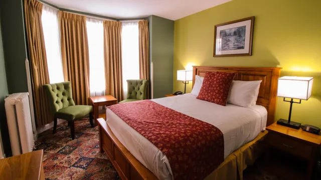 غرفة كلاسيكية بسرير كينج وسرير كوين، James Bay Inn Hotel Suites Cottage 1/8