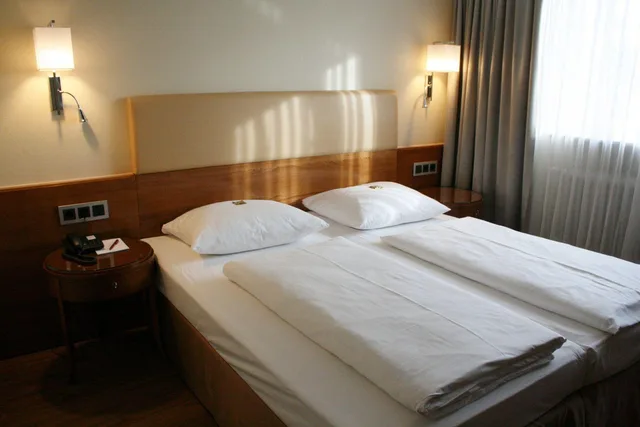 غرفة ديلوكس رباعية بغرفتي نوم، TOP Hotel Duerer 1/1