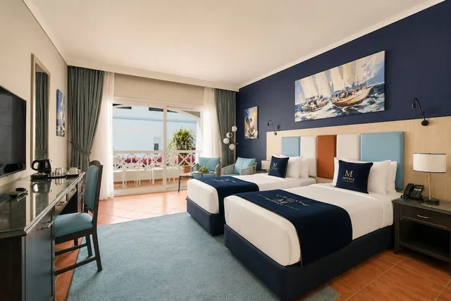 Classic, Twin Beds, Garden or Pool View، M Hotels at Porto Marina 1/6