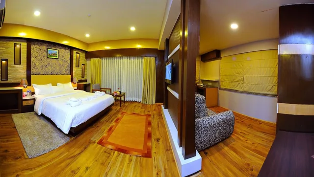 جناح جونيور بسرير كينج بإطلالة على البحيرة، Hotel Queens Park 2/6