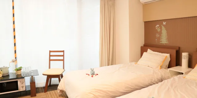 غرفة ثلاثية بسرير مزدوج وسريرين منفصلين في الطابق العلوي، Sakuragawa Riverside Hotel 1/10