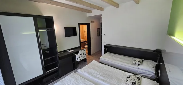 غرفة ثلاثية بسرير مزدوج وسرير فردي بشرفة، Ecohotel Primavera 1/6