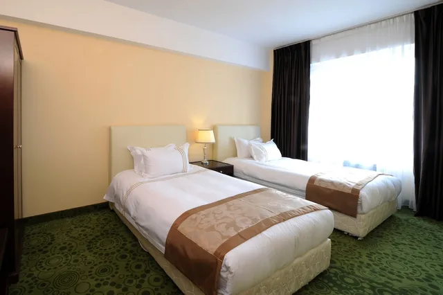 غرفة اقتصادية بأربعة أسرّة بغرفتي نوم، Alpha Hotel Mongolia 1/2