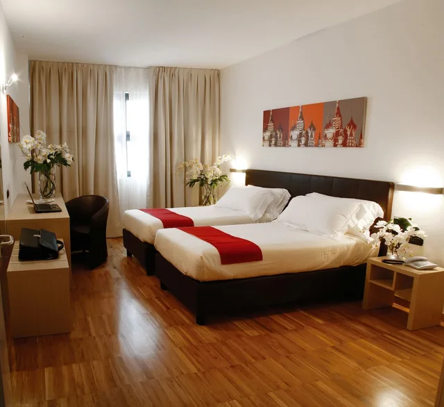 غرفة ديلوكس بسرير كوين، Euro Hotel Residence 1/2