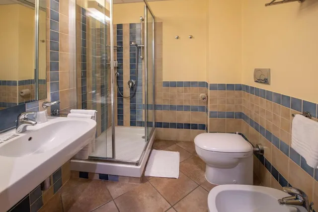 غرفة كلاسيكية في الطابق الأرضي، Calaserena Resort 2/3