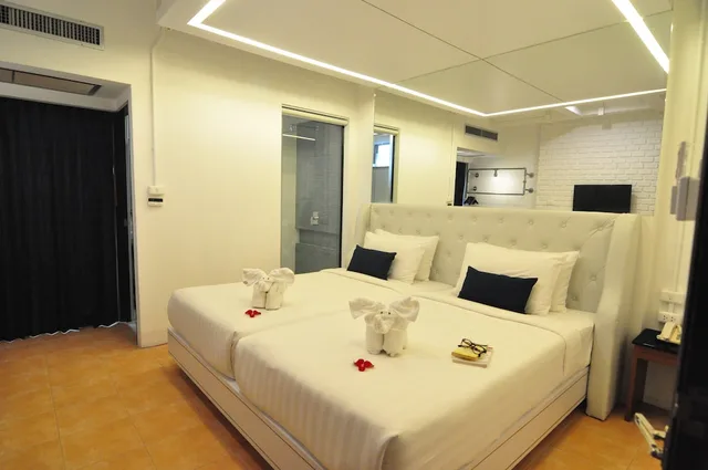 غرفة ديلوكس بسريرين منفصلين، Forty Winks Phuket 1/4