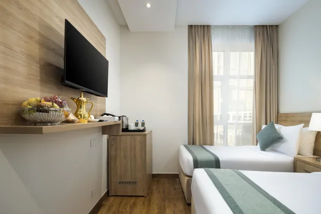 غرفة بسريرين منفصلين، فندق وورث إيليت(Worth Elite Hotel) 7/10