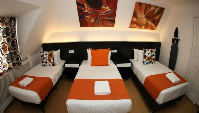 Classic, Suite, 1 Queen and 3 Single Beds, City View, Heathrow Inn 1/1