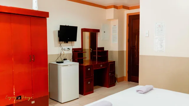 غرفة بسرير كوين بشرفة، Imperial Ridge Pension House 3/7