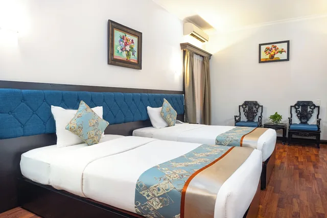 غرفة بريميير ديلوكس بسريرين منفصلين، Royal Hotel Saigon 1/6