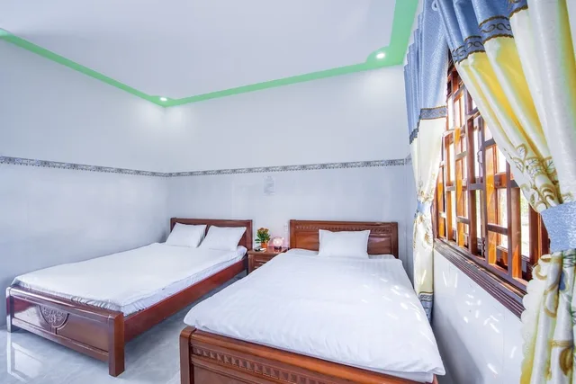 غرفة أساسية بسريرين كوين بإطلالة على المسبح، Hotel Nguyen Toan 5/8